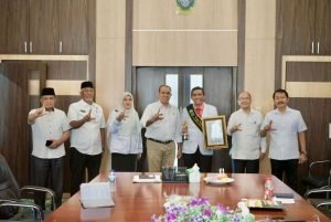 Pj Bupati Langkat Apresiasi dr. Agus Salim sebagai Tenaga Medis Teladan Nasional: Bukti Pengabdian Tanpa Batas