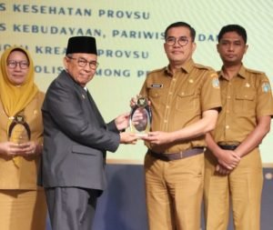 Naslindo Sirait Terima Penghargaan Keterbukaan Informasi Publik 2024, Tegaskan Komitmen Transparansi