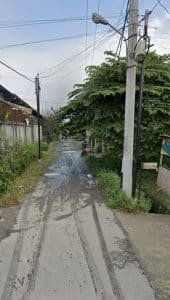 Jalan Balai Desa dan Jalan Gereja Desa Helvetia Bagai Kubangan Kerbau. Warga Hendak Merayakan Natal Harus Terobos Jalan Becek dan&nbsp; Berlubang