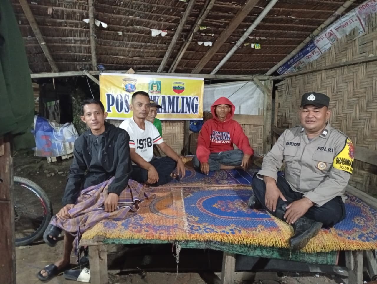 Bhabinkamtibmas Polsek Salapian Dorong Warga Aktif Jaga Keamanan Melalui Satkamling